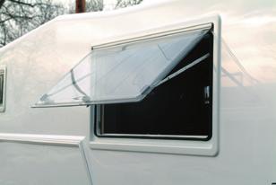 charger Sliding basement tray Very low step into bed; highest headroom above cab over bed of any camper Dometic