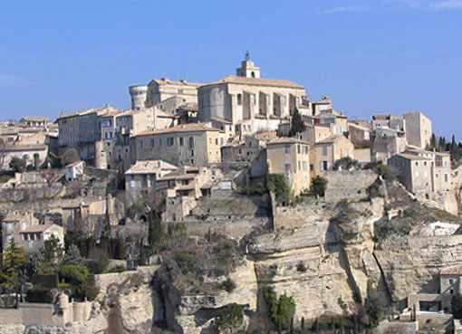 St Remy of Provence, its hotels and quaint residences, its shadowed plazas with their fountains and its