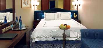 ocea view STATEROOM Category E Cetrally located amidships o deck 6, these comfortable 143-square-foot staterooms are awash i atural sulight from the expasive widow with