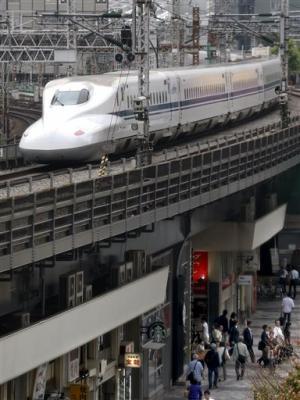 Line in Tokyo.  (AP Photo/Shizuo heads for Tokyo Station on the Tokaido Main Line in Tokyo.