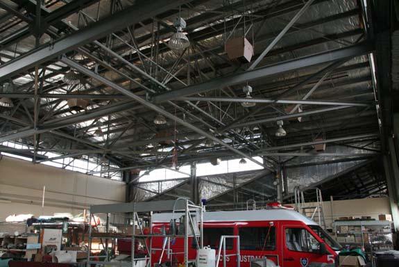 Interior of the hangar section of the workshop (GBA, 2008) Condition and Integrity: After periodic upgrading of services equipment and some renovation in the last decade, the fabric of the workshop