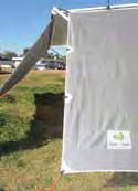In the case of a Pop Top, the side sunscreen attaches to your awning arm (when extended) by means of velcro straps.