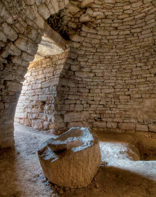 Interior view of the tholos or beehive tomb highlights the Mycenaean building technique that allowed the