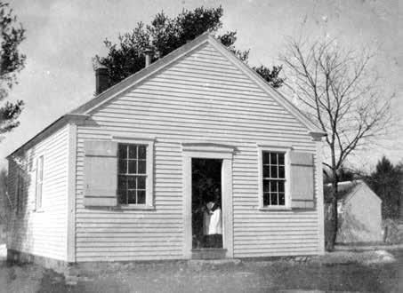 9. Hornbine School Above, Hornbine School in 1900W. Below, children visit the school to experience what a one-room school house was like. Courtesy of Dave Downs.