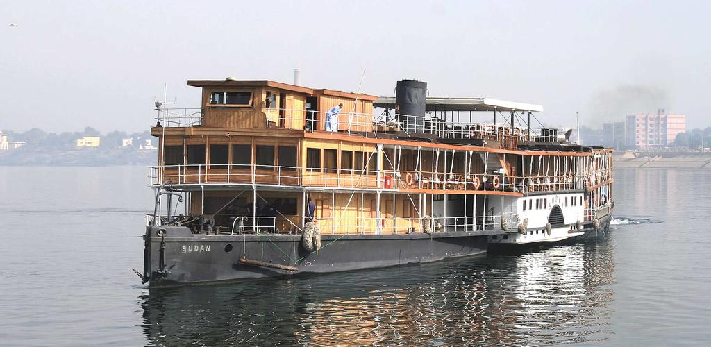 SUDAN - SIDE WHEEL PADDLE STEAMER Setting for a Novel, Two Movies and Other Theatrical Works Since at least 1921 the side wheel paddle steamer SUDAN has periodically plied the waters of the River