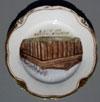 Lot # 151 - Ceramic plate with a picture of the "Oregon Building P.P.I.E. 1915". Around the edge is a gold border. The back is marked "Mabsburg-Cina", "M Z', "Austria". Size: 7" diameter.