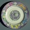 Lot # 242 - White ceramic dinner plate with Art Deco style purple and gray Trylon and Perisphere in center with "1940" above and "New York World's Fair" in a circle around the T&P.