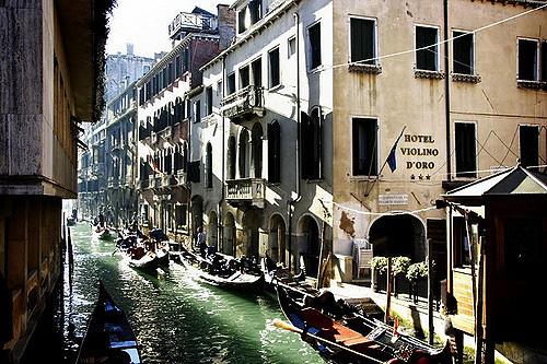 golden barges, courtesans in gondolas and crumbling palaces facing streets made of water.