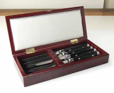 gift box includes four High Plains TM steak knives with black Delrin  MADE