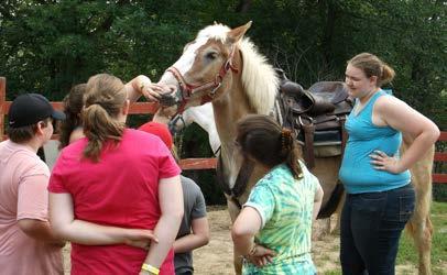 Kids are given a checklist of skills that they must pass to move up a level in their riding.