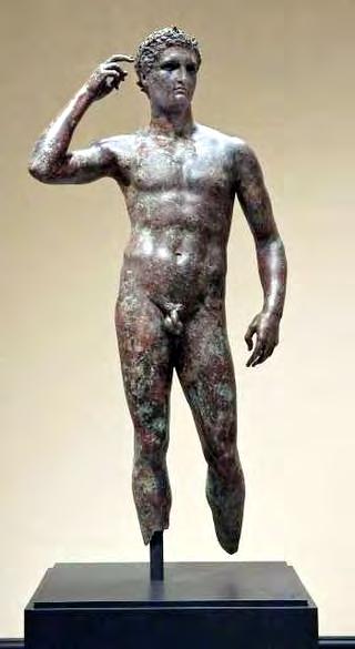 The Getty Bronze Found beneath the Mediterranean Sea, is a victorious athlete crowning himself with a laurel wreath.