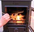 When only burning wood it is recommended that a 1 cm deep ash bed be established and maintained on the grate of the