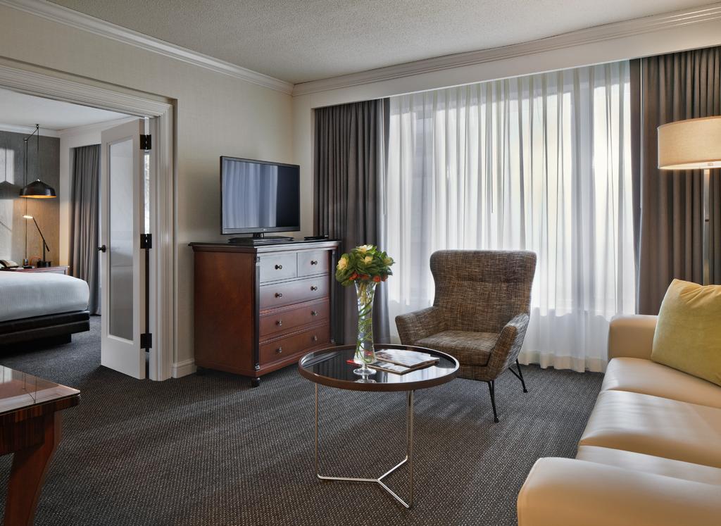 CITY-SOPHISTICATED REPOSE DASHED WITH ARTFUL CHARACTER mingling ease and allure, The Logan s 391 boldly renovated guest rooms and suites are well-curated perfection.