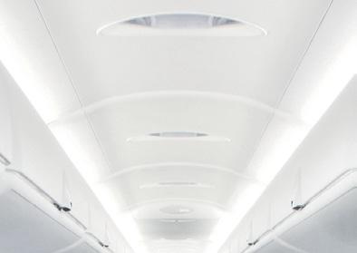 INVITING INTERIORS Q400 passengers benefit from larger overhead bins that easily accommodate two airline-standard roller bags.