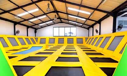 Each trampoline park consists of a foam pit, basketball arena, interconnected trampolines,a dodge-ball arena, Olympic trampolines, Ninja Pit, climbing wall and kids playground.