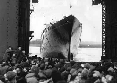 The Royal Yacht Britannia being launched at the John Brown & Company shipyard Clydebank, Scotland,16