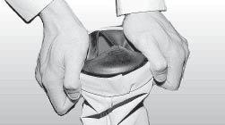 Slide the glove and cone down the garment sleeve and into the rubber cuff; make sure that the little finger of