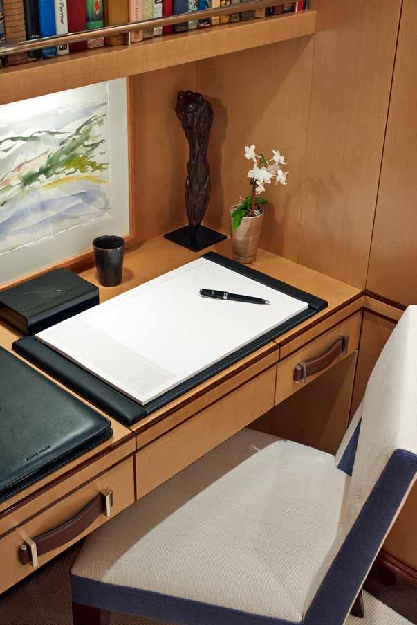 stateroom features a writing desk and TV/entertainment Large swim platform with