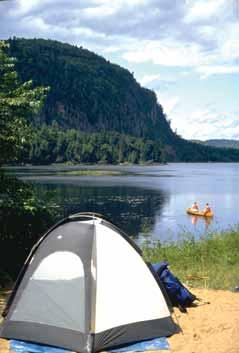 ADDITIONAL ACTIVITIES CANOE-CAMPING Paddle across tranquil lakes and portage over the same trails once used by Aboriginal people and the coureurs des bois.
