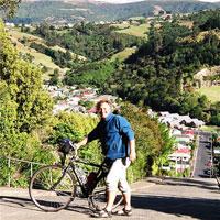 CHAPTER 11. OTAGO 175 cycle to the top. When I got home, I drilled a hole in that dollar and hung it over my bed.