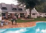 R2,195m Charming smallholding on 5HA on Umzimkulu river, beautiful face brick home with 3 bedrooms and 2 bathrooms, lounge/dining room plus family room, double garage and outside laundry PLUS labour