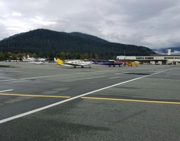 V. AIRPORT RESTRICTED AREAS The Juneau International Airport has several different levels of restricted areas within the airfield boundary.