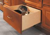 A CONVENIENT POTS AND PANS DRAWER was specifically designed for storage of large cookware.