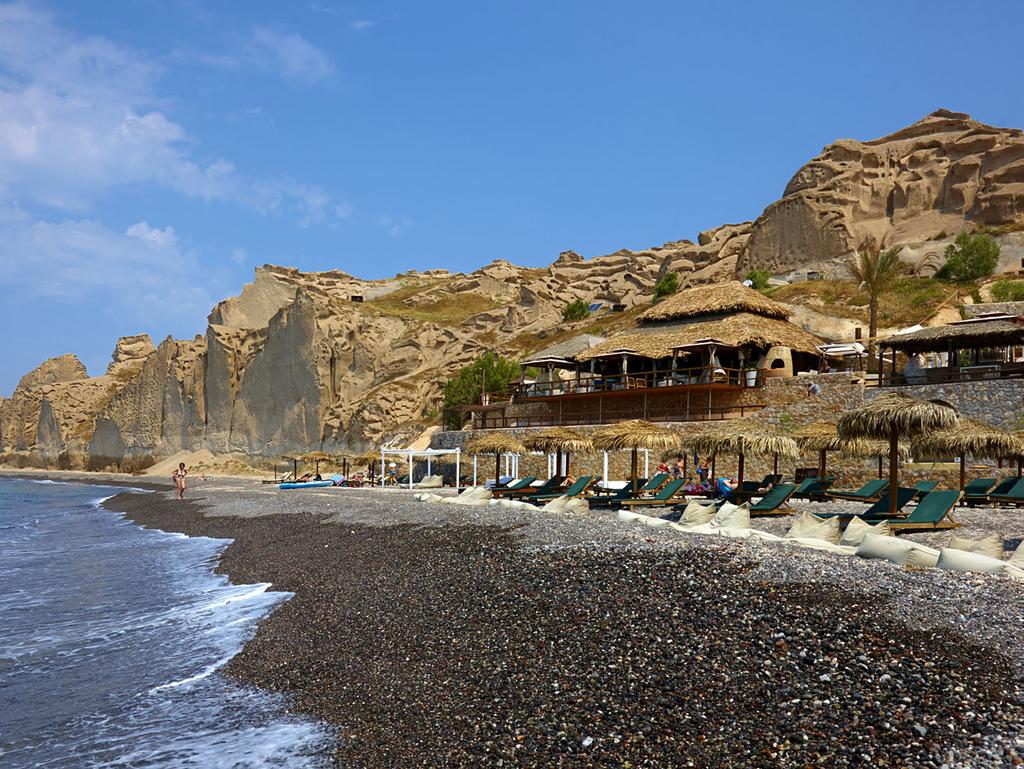Spend your day in Theros Wave War If you wish to spend your day on the beach, we propose our sister property, Theros Wave Bar, at the impressive volcanic beach of Vlychada.