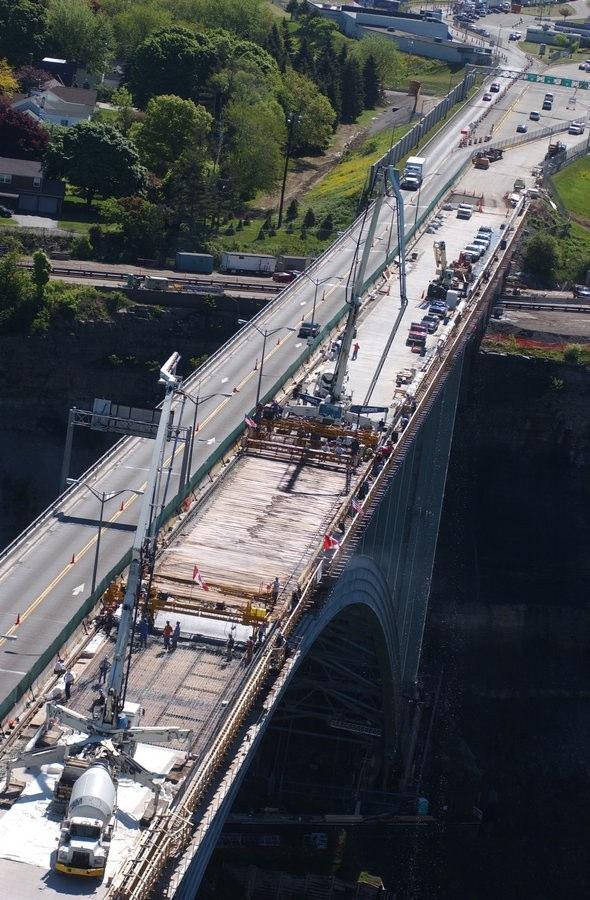 "It was a plywood deck hanging from the underside of the bridge by heavy chains, nine feet below the bridge," Rawe explained. "It was both a safety and an access platform," he added.