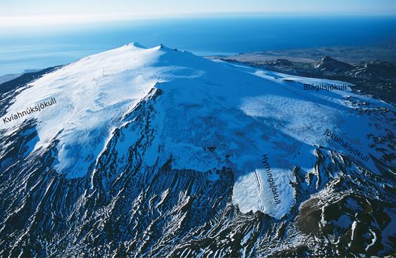 T. Jóhannesson et al. Figure 1. Snæfellsjökull seen from the east. The location of the outlet glaciers mentioned in the text is indicated on the photograph. Snæfellsjökull frá austri.
