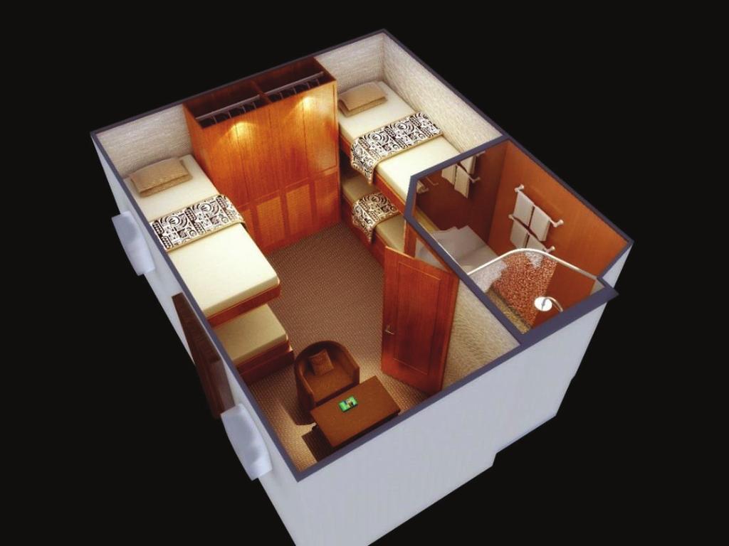 private bathroom with shower, wardrobe, sitting area.