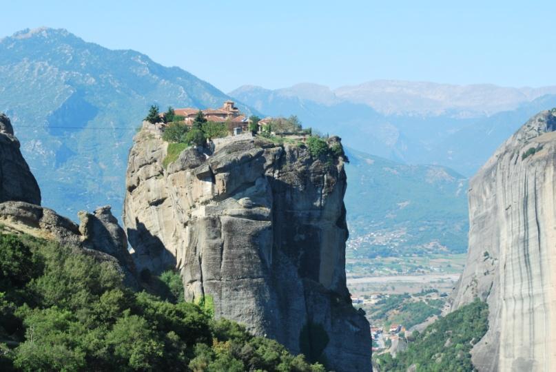 Among striking scenery, perched on top of huge rocks which seem to be suspended in mid-air, stand ageless