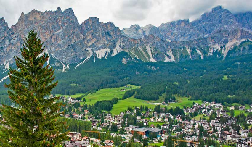 THE DOLOMITES, ITALY DESTINATION GUIDE Cherished for decades by high society for its après-ski scene, Cortina lies at the center of the Valle d Ampezzo, high in the Dolomite mountains.