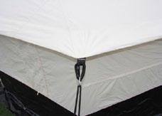 2 m outer tent is maintained in position on the ridge pipe with 2 canvas sleeves of Width: 4 m 100 mm long, closed by Velcro on full 100 mm length, one sleeve at each end of the ridge, at 200 mm from