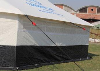 5 m from one corner, on one end of the tent, between the corner of one side wall and the corner of one tent door.