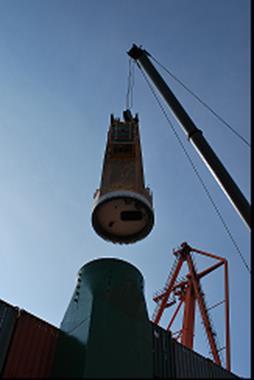 lifting the crane housing onto the crane column.