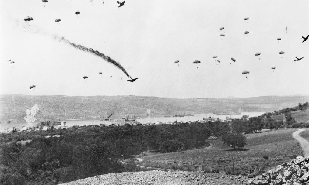 German paratroops, part of the German airborne invasion of Crete, parachuting onto the village of Suda.