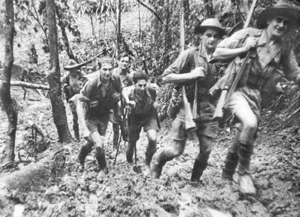 Left, members of D Company, 39th Battalion, on the Kokoda Trail. Right to left: Warrant Officer 2 R. Marsh, Private (Pte) G. Palmer, Pte J. Manol, Pte J. Tonkins, Pte A.