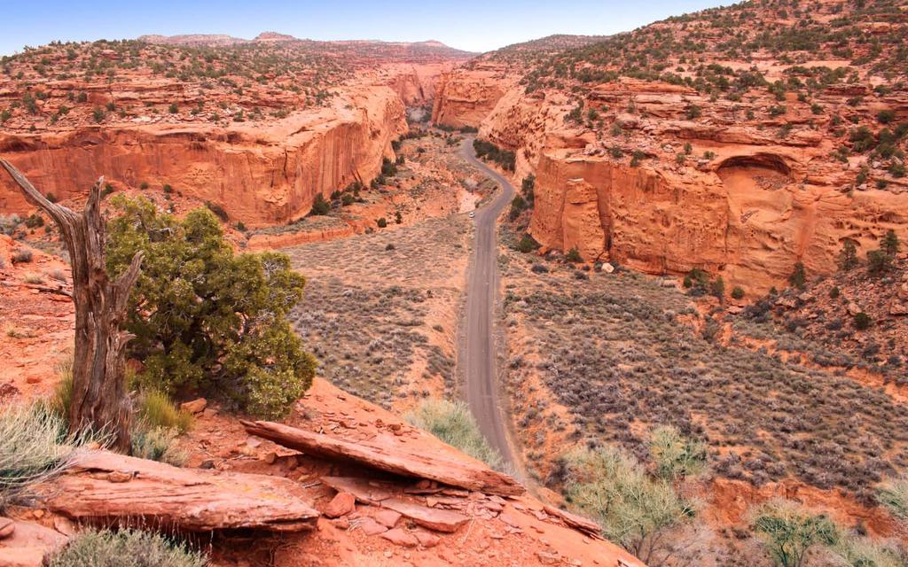 Burr Trail - Scenic Backway Starting in the town of Boulder, or other nearby communities, journey through steep slickrock canyons, and the royal vistas of buttes, mesas,