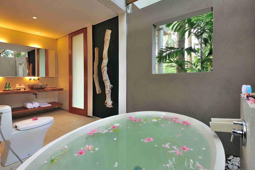 room, and calming tropical garden view.