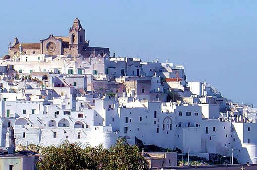 OSTUNI Ostuni is one of the most stunning cities in southern Italy famous for the dazzling effect of its whitewashed houses. It is a genuine and charming example of Mediterranean architecture.