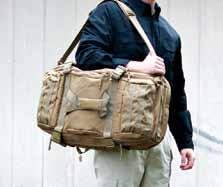 The entire duffle pack is clad in MOLLE webbing for the addition of gear and/or pouches.