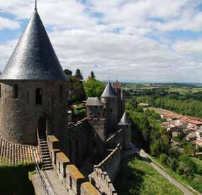 of France. Carcassonne looks like a fairy-tale medieval city. It is the largest fortified town in Europe and filming location for Robin Hood.
