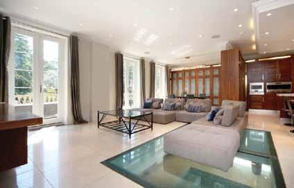 The high quality internal fittings include marble and wood flooring and a superb kitchen/breakfast room which blends seamlessly into the family room and which has a feature glass floor with views