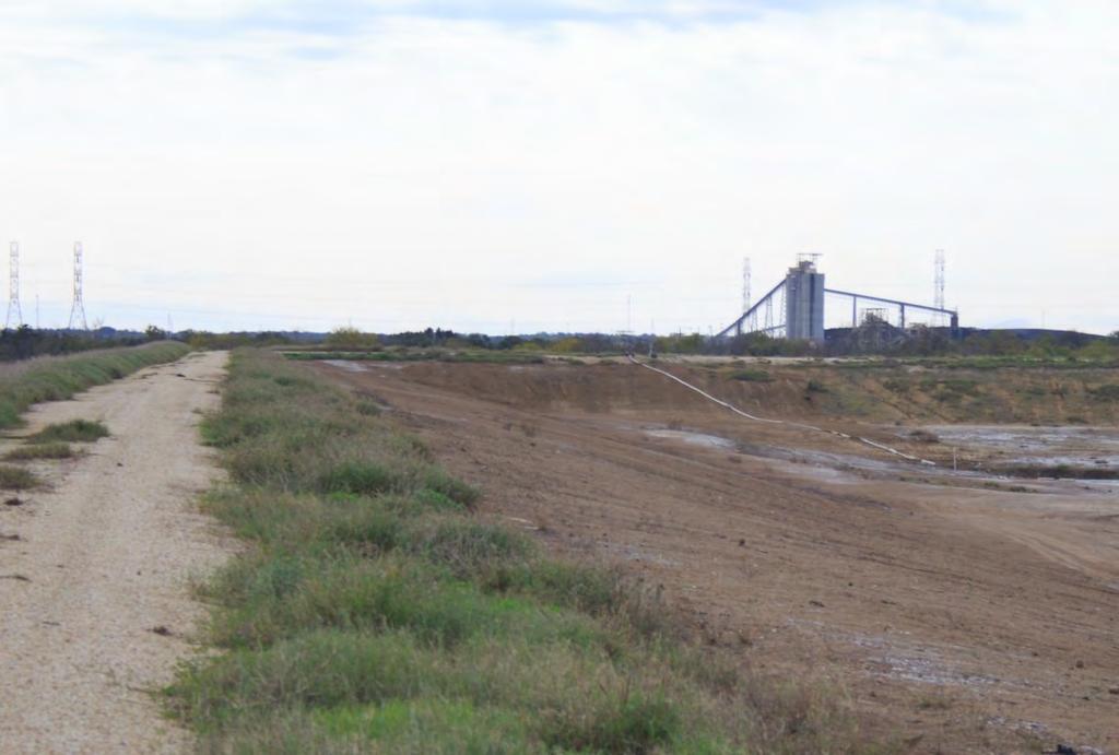 Photograph: 3 Fly Ash Landfill standing on western berm facing southeast.