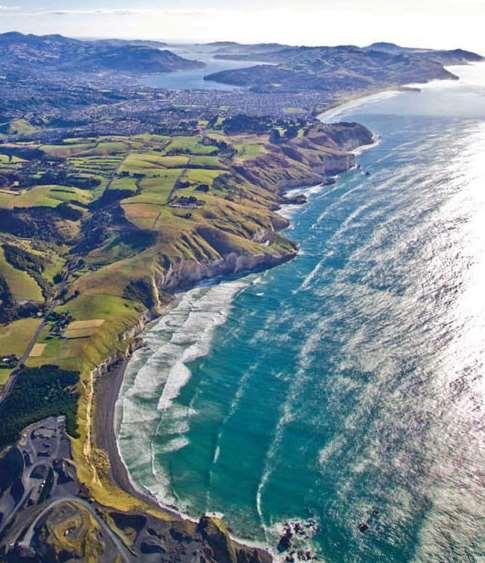 7.LOCATION Encircling hills and the Otago Peninsula, Dunedin is a compact and lively city of around 130,000 people.