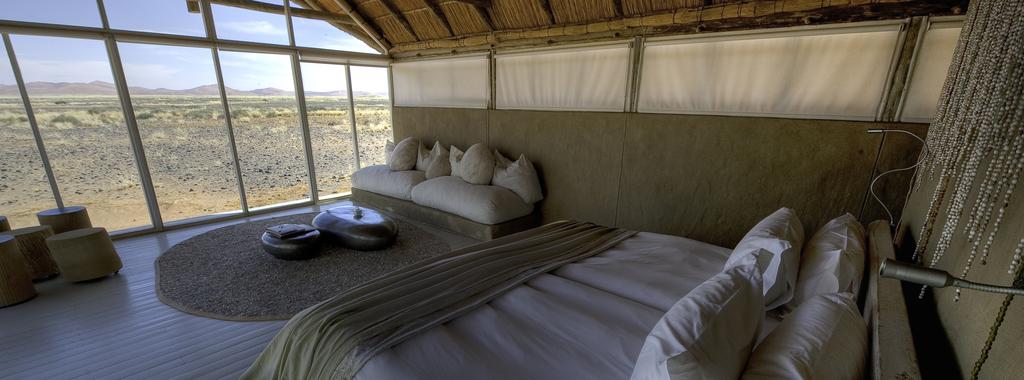 Ensuite Bathrooms, Laundry, Local Drinks, Pool, Recharge Facilities Premium imported brand drinks and Champagne, curio shop items, scenic helicopter tours 22 FEB 2018-23 FEB 2018 Sossusvlei
