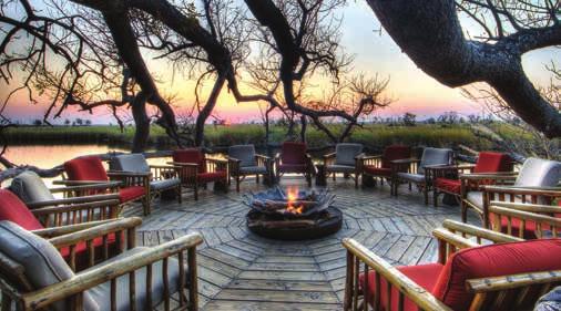 GUNN S CAMP Overlooking the legendary Chief s Island, the water-based Gunn s Camp is one of the last few remaining luxury, vintage safari camps, set under leafy palms and African Ebony to blend