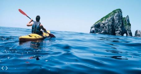 Guided Kayaking Tour: The sheltered, turquoise waters of Pigeon Bay are perfect for kayaking and offers a chance to enjoy another view of Annandale.