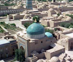 Continue on to the ancient Silk Road oasis of Khiva, crossing en route the Turkmen-Uzbek border, where we will change motor coach and driver.